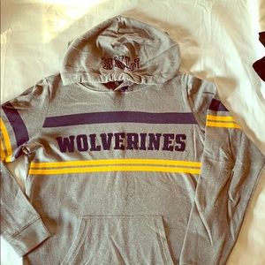 Michigan Wolverines sweatshirt.